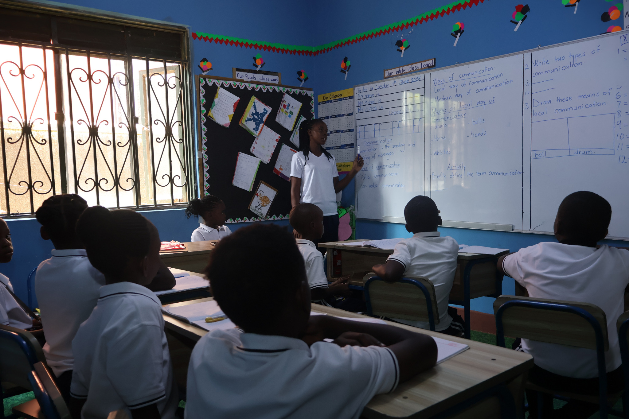 Teacher leading a classroom lesson